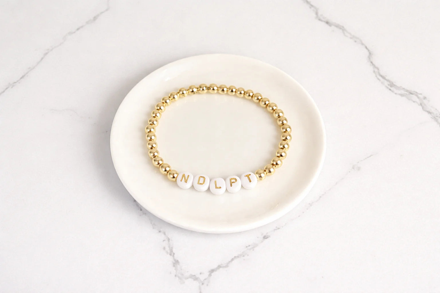 Needlepoint (NDLPT)  Bracelet By Lottie Lew