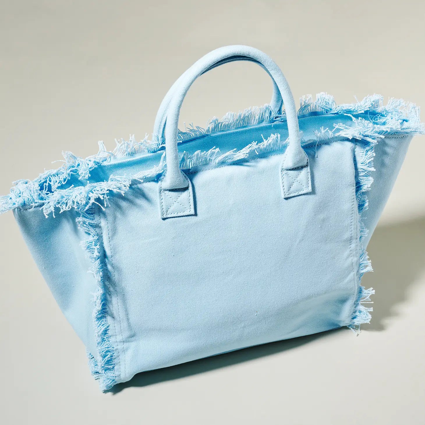 Fringe beach bag sales